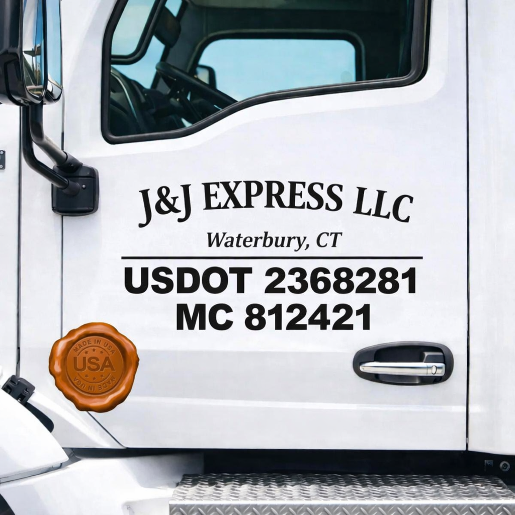 USDOT and MC number decals on a commercial truck door